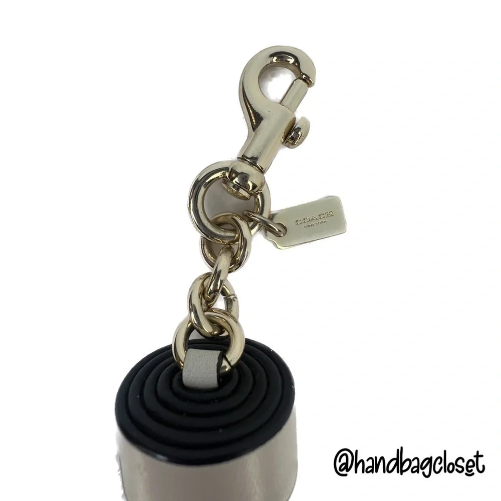 COACH LEATHER TASSEL BAG CHARM (F58505)
GOLD/BLACK KEY CHAIN KEYCHAIN - Picture 6 of 12